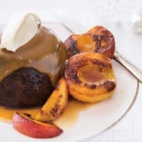 Luxury Christmas Pudding With Sticky Pan Peaches And Caramel Sauce